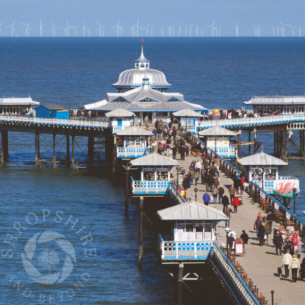 Llandudno pier, looking to the offshore wind farm, Wales. Llandudno pier