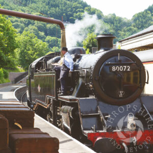 Steam train taking on water SC24
